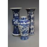 THREE ORIENTAL BLUE AND WHITE VASES, one with four character mark to base, tallest H 19.5