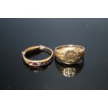 TWO YELLOW METAL RINGS, both look to be high carat, the first a signet ring with intertwined MC