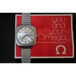 AN OMEGA GENEVE AUTOMATIC DAY/DATE WRIST WATCH, coming with Omega booklet, a/f, W 4 cm