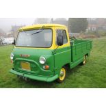 A BRITISH LEYLAND 1967 MORRIS COMMERCIAL J4 PICK UP DROPSIDE LORRY, in green and yellow, first owned