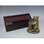 A LATE 19TH / EARLY 20TH CENTURY GILT BRASS VESTA CASE / INKWELL IN THE FORM OF A BEAR, H 10.5 cm,