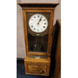 AN OAK CASED 'THE GLEDHILL-BROOK TIME RECORDERS LTD.' CLOCKING IN CLOCK, with original painted