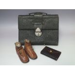 A LEATHER TRAVEL STATIONERY CASE WITH FITTED INTERIOR, together with a small leather card wallet and