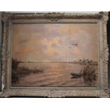 AN EARLY 20TH CENTURY STORMY FENLAND SCENE, with moored punt and geese in flight, church beyond,