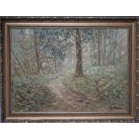 HENRY E. FOSTER (1921-2010). A wooded landscape, signed lower right, oil on canvas, gilt framed,