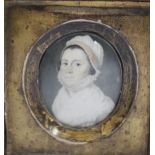 A LATE 19TH / EARLY 20TH CENTURY OVAL PORTRAIT MINIATURE OF A LADY IN A WHITE DRESS AND BONNET