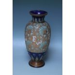 A LARGE ROYAL DOULTON STONEWARE VASE, of baluster form, painted floral detail, impressed marks to