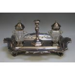 A SILVER PLATED DESK STAND WITH HALLMARKED SILVER TOPPED INKWELLS DATED SHEFFIELD 1877, W 25 cm