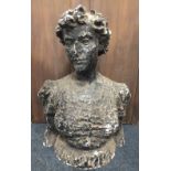 ARNOLD MACHIN (1911-1999). A painted black plaster bust depicting a female, H 70 cm