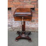 A 19TH CENTURY ROSEWOOD TEA POY, the hinged lid opening to reveal a part fitted interior with four