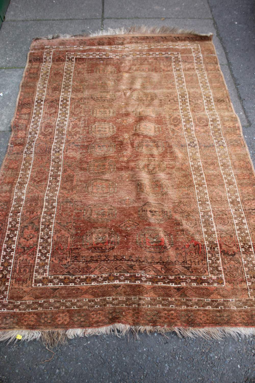 A BOKHARA STYLE WOOLLEN RUG, with an all over pattern on a mainly red ground, 137 x 208 cm - Faded - Image 2 of 6