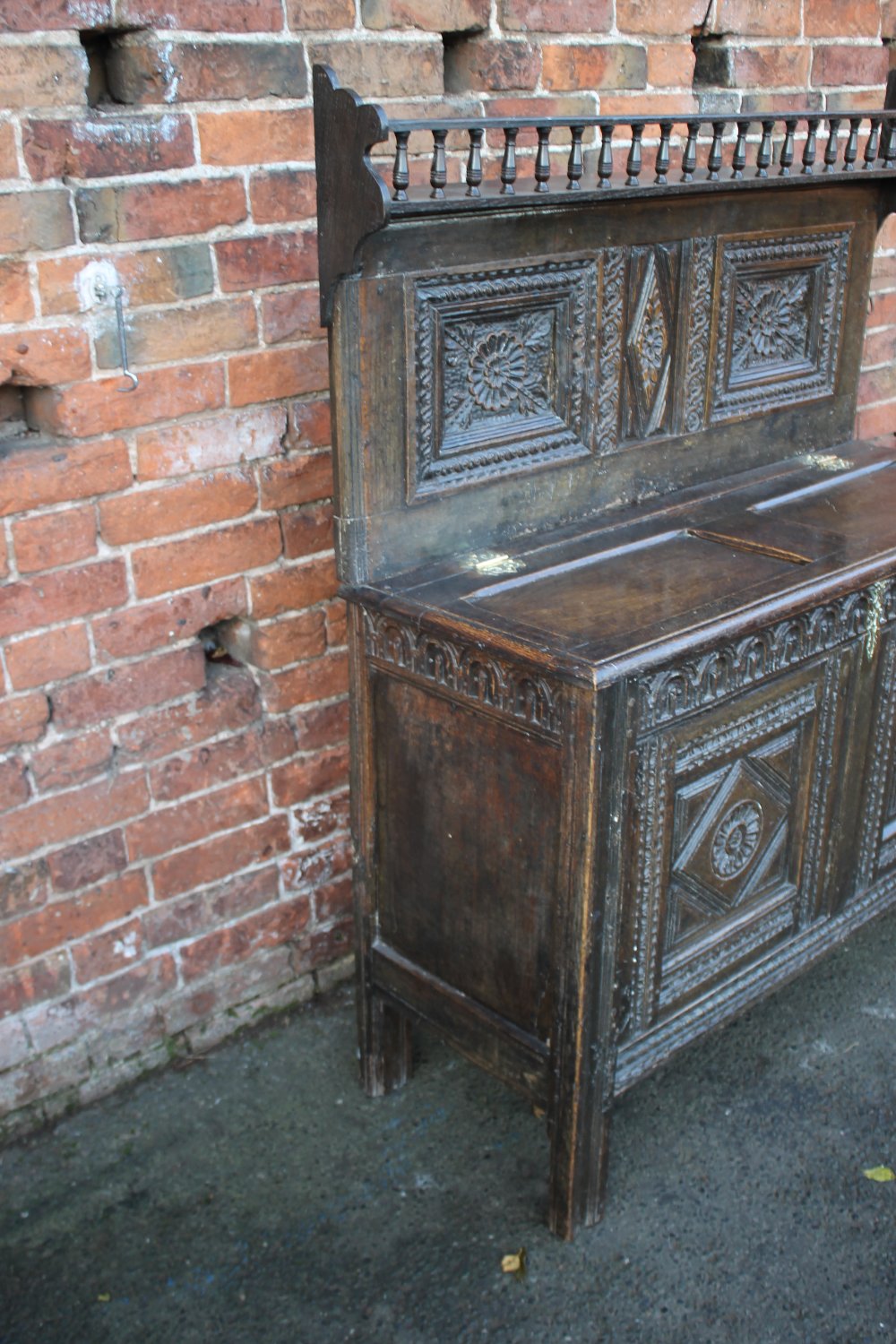 A 19TH CENTURY AND LATER CARVED OAK CUPBOARD, the lower coffer section with half hinged lid, - Image 4 of 6