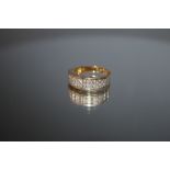 A TWIN ROW DIAMOND RING, stamped 750, approx weight 6.1g, ring size o 1/2