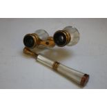 A PAIR OF LATE 19TH / EARLY 20TH CENTURY FRENCH GILT BRASS AND MOTHER OF PEARL OPERA GLASSES, with