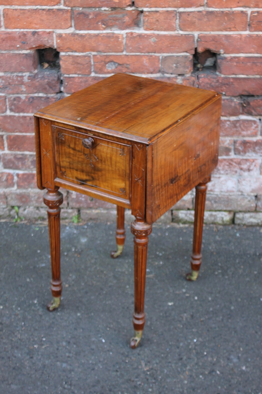 A 19TH CENTURY MAHOGANY SMALL DROPLEAF SIDE TABLE, the top with incised detail, fall front