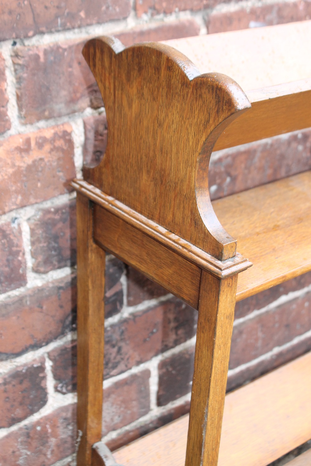 A 1920S OAK BOOK TROUGH, of three stages with shaped supports and original cappings and castors, H - Image 3 of 6