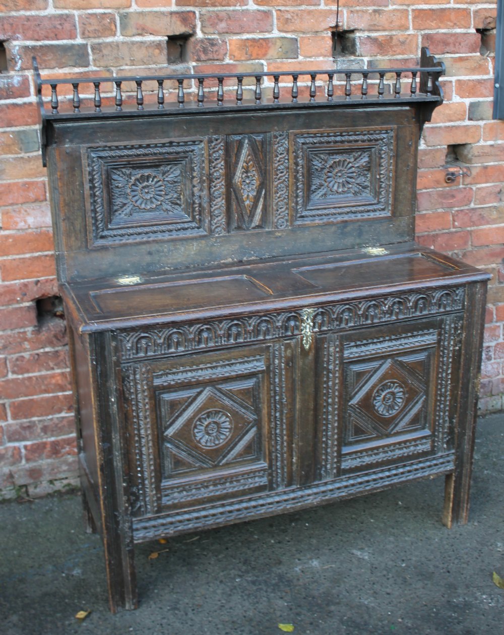 A 19TH CENTURY AND LATER CARVED OAK CUPBOARD, the lower coffer section with half hinged lid, - Image 2 of 6