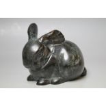 AN ART DECO STYLE BRONZE RABBIT, hollow, W 11.5 cm