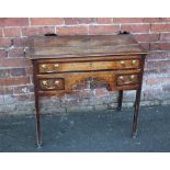 A GEORGE III OAK AND MAHOGANY LOWBOY, with cross banded mahogany detail, long frieze drawer with two