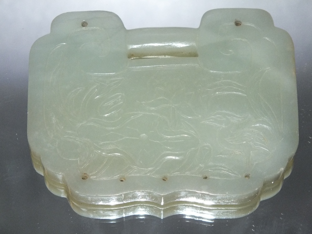 A LARGE CHINESE CELADON JADE BUCKLE / PENDANT, finely carved in shallow relief with bird and foliate - Image 2 of 4
