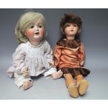 AN EARLY 20TH CENTURY HEINRICH HANDWERCK BISQUE HEAD DOLL, composite body, impressed H.W. Germany