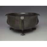 A LARGE ARTS AND CRAFTS PEWTER FOOTED BOWL, of typical form with hammered finish, marked Hutton