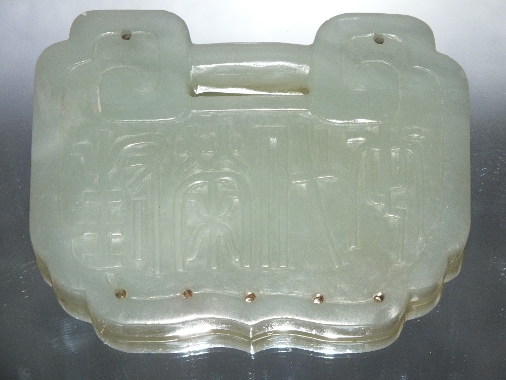 A LARGE CHINESE CELADON JADE BUCKLE / PENDANT, finely carved in shallow relief with bird and foliate - Image 3 of 4