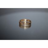 A HALLMARKED 9 CARAT GOLD CHANNEL SET DIAMOND RING, approx weight 3.1g, ring size L