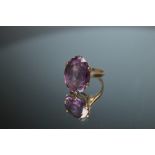 A HALLMARKED 9 CARAT GOLD LARGE AMETHYST RING, the oval amethyst measures approx 20mm x 14mm, approx