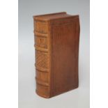 A 19TH CENTURY MAHOGANY TABLE SNUFF BOX, formed as a antique novel, sliding panel to one side, L