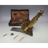 A GEORGE III LACQUERED BRASS SOLAR MICROSCOPE BY DOLLOND OF LONDON c.1780, the square brass platform