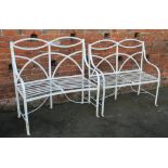 A PAIR OF CAST GARDEN BENCHES, with open scroll backs, W 106 cm