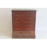 A SMALL STAINED PINE SEVEN DRAWER COLLECTORS' CABINET A/F, H 56 cm, W 47 cm, D 29 cm