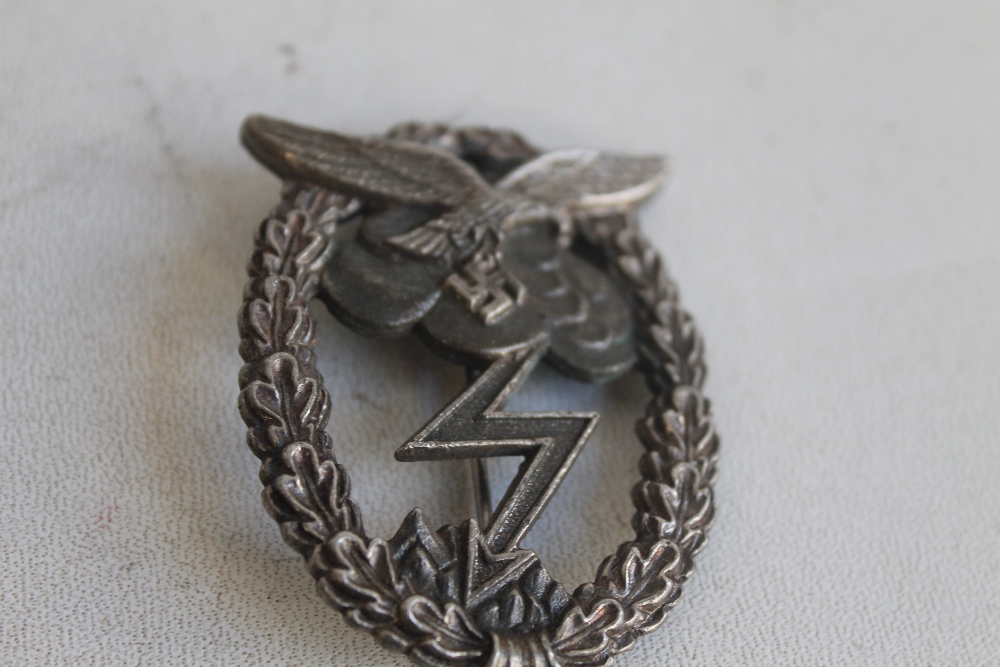 A COLLECTION OF GERMAN TYPE BADGES, to include a WWI honour cross with swords and a British Lancers - Image 3 of 5