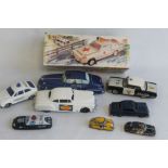 A BOXED TINPLATE BATTERY OPERATED SPANISH EGE POLICE CAR, a Welso "RMC 141" tinplate friction polic
