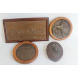 A PRESSED COPPER ALLOY PLAQUE depicting The Last Supper, along with a smaller one of a dog, another