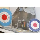 A HAWKER SIDDELEY HARRIER JET SIDE FUSELAGE PANEL, together with two RAF roundels on metal backgro