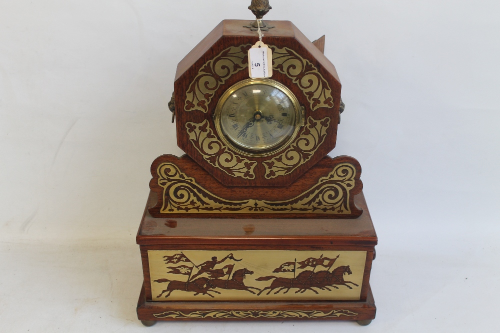 A REGENCY ROSEWOOD VENEERED AND BRASS INLAID MANTEL CLOCK, fitted key draw to base, later quartz mo
