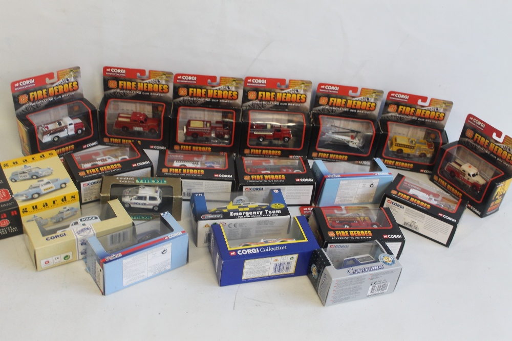 A COLLECTION OF BOXED POLICE AND FIRE SERVICE DIECAST VEHICLES to include Corgi Fire Heroes, Carara