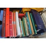 TWENTY ONE ALBUMS AND STOCK BOOKS containing a large collection of various worldwide stamps