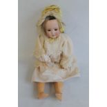 A VINTAGE SIMON AND HALBIG BALL JOINTED PORCELAIN DOLL