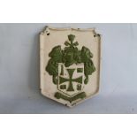 WOLVERHAMPTON COAT OF ARMS, A CAST METAL WALL PLAQUE inscribed "Out of darkness cometh light"