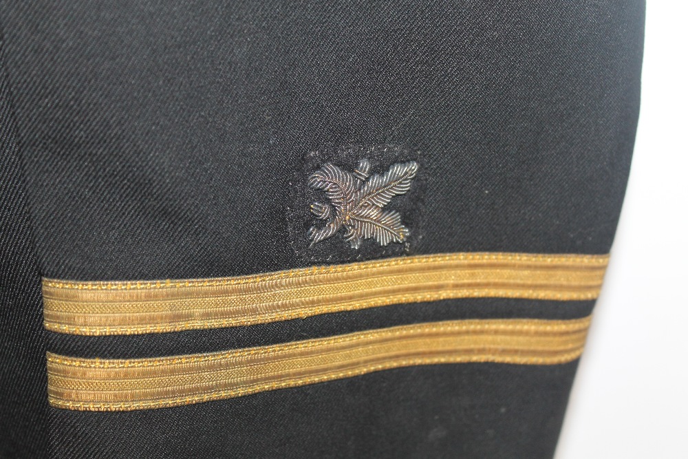 A VINTAGE US NAVY PEAK CAP with all weather cover, an associated jacket and an Airbourne (?) side c - Image 2 of 4