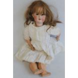 A VINTAGE ARMAND MARSEILLE BALL JOINTED PORCELAIN DOLL