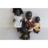 FOUR VINTAGE BLACK DOLLS, to include a jointed composition type (4)