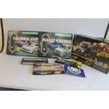 THREE INCOMPLETE BOXED SCALEXTRIC SETS, to include Marks & Spencer "The Italian Job", Rally Racing