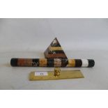 A THREE PIECE DESK SET, consisting of a brass rule, hardstone rule and pyramid paperweight
