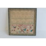 A 19TH CENTURY SAMPLER in multi-coloured threads depicting birds, crown and flowers, named and date
