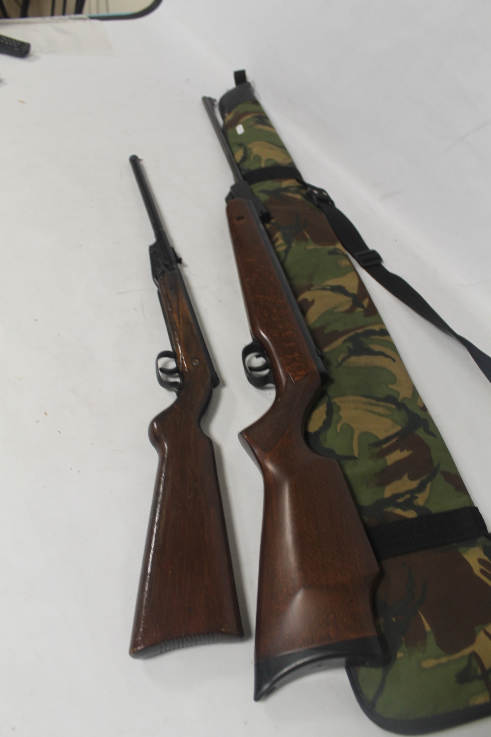 A NORICA WEST AIR RIFLE IN CAMOUFLAGE CARRY CASE, together with an original MOD air rifle