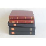 FIVE STANLEY GIBBONS ALBUMS containing mainly Guernsey together with Jersey, Alderney and the Isle